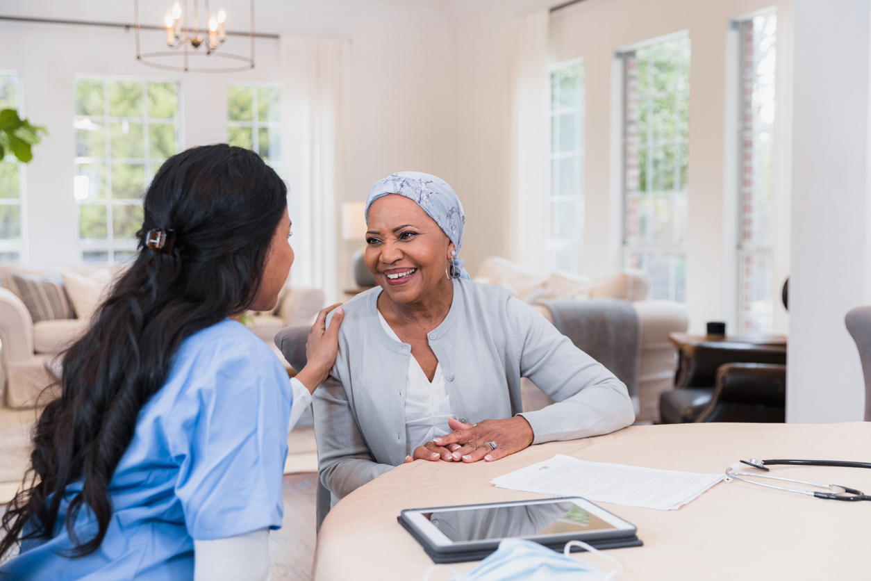 provider and patient at home during 1 of the 3 stages of hospice care