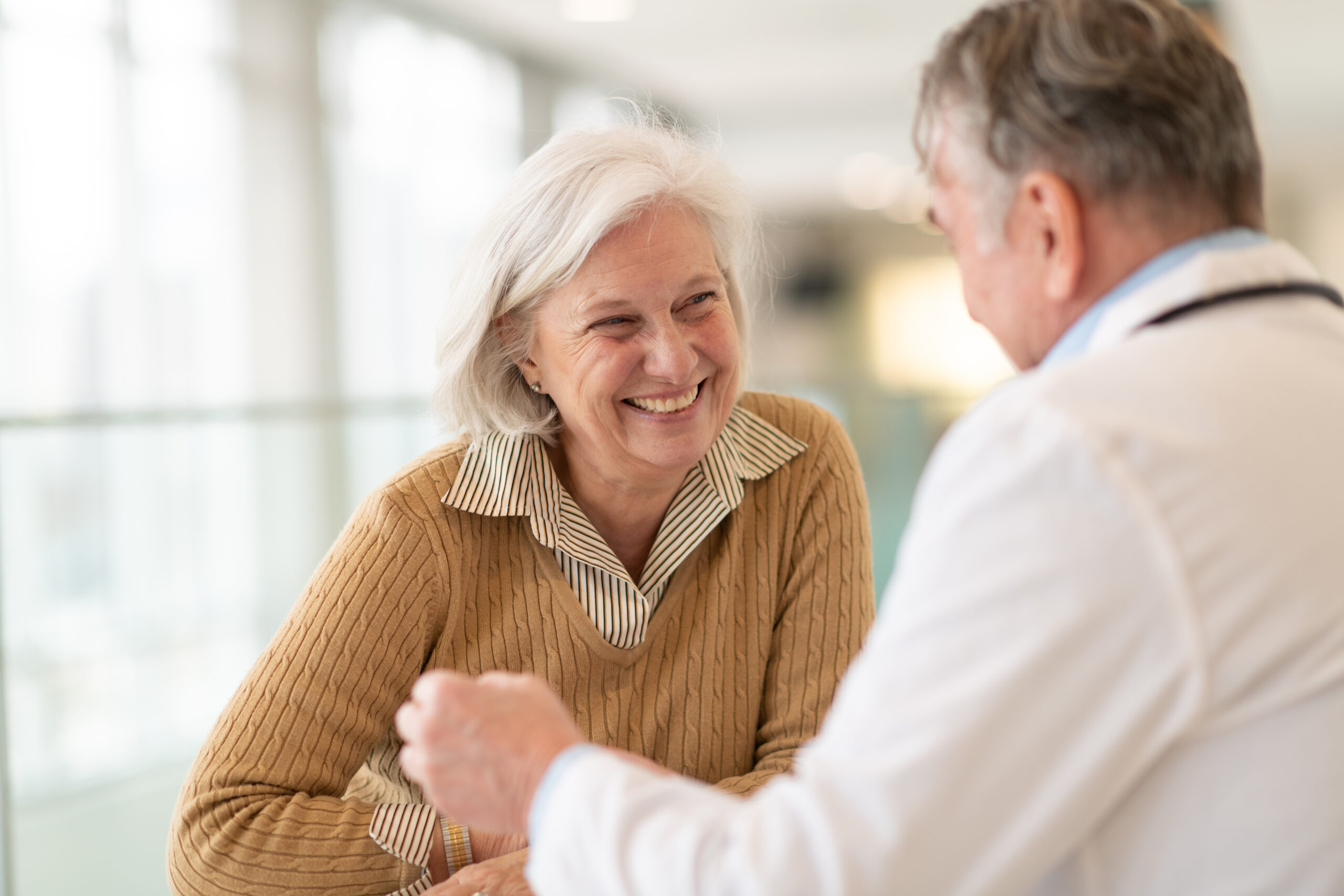 Happy older woman after finding the right doctor for seniors