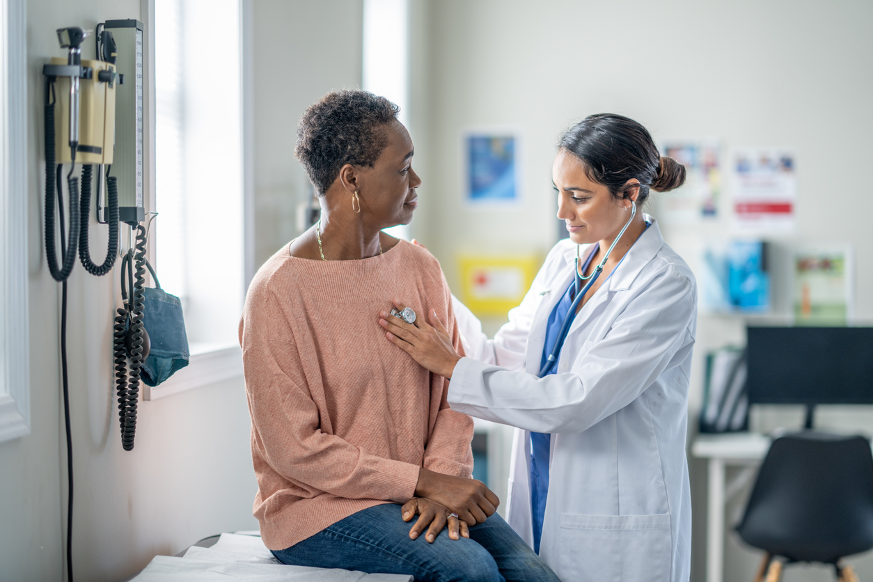 older woman at the office experiencing a senior citizen health checkup