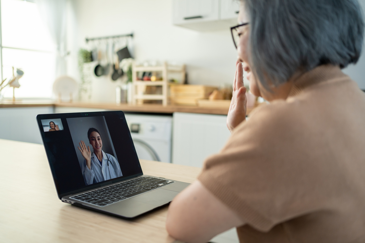 elderly-woman-taking-telemedicine-appointment-from-kitchen